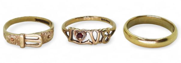An 18ct gold  wedding ring, hallmarked Glasgow 1933, weight 3.8gms, and two 9ct gold rings, weight