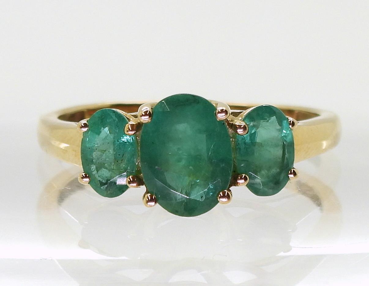 A 9ct gold emerald three stone ring, size T, weight 2.4gms Condition Report:Available upon request - Image 2 of 4