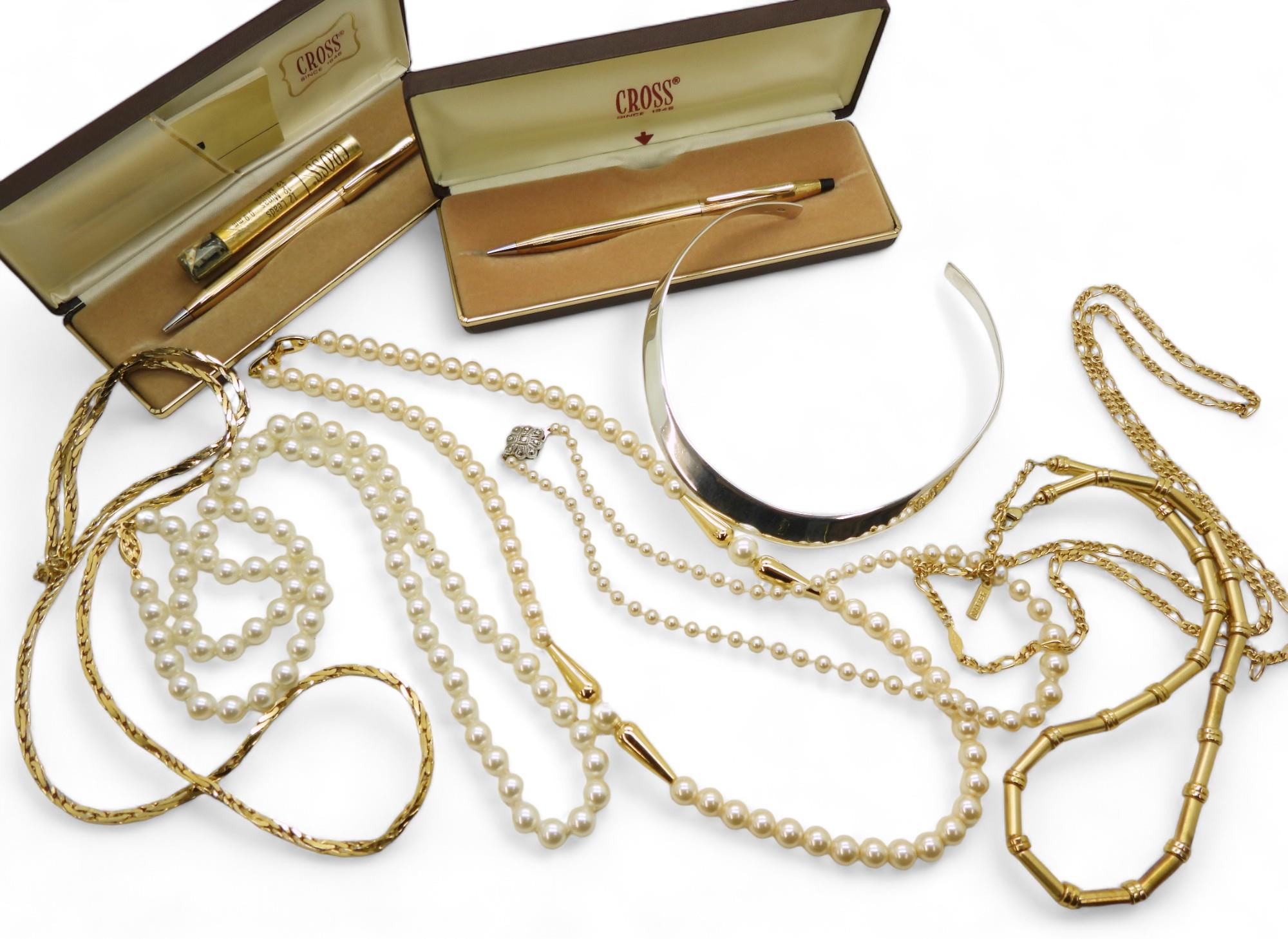 A silver torc necklace, A Cross gold plated pen and pencil set, two Napier costume jewellery