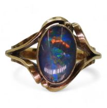 A 10K gold ring set with an opal doublet, size O1/2, weight 4.5gms Condition Report:Available upon