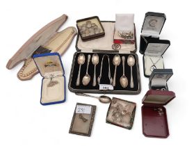 A collection of silver and costume jewellery including a set of tea spoons and sugar tongs, by