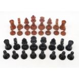 A chess set, with kings measuring approx. 8.5cm in height;  with a large folding leather board