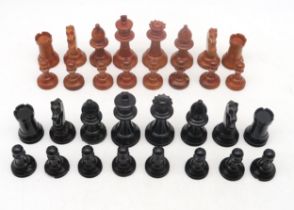 A chess set, with kings measuring approx. 8.5cm in height;  with a large folding leather board