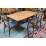 A mid 20th century teak A.H McIntosh gateleg dining table and six chairs, table, 73cm high x 150cm