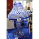 A blue flashed and cut glass table lamp and shade Condition Report:Available upon request