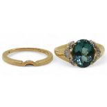 A 14k gold teal colour tourmaline and diamond ring, size O1/2, together with a shaped to fit band