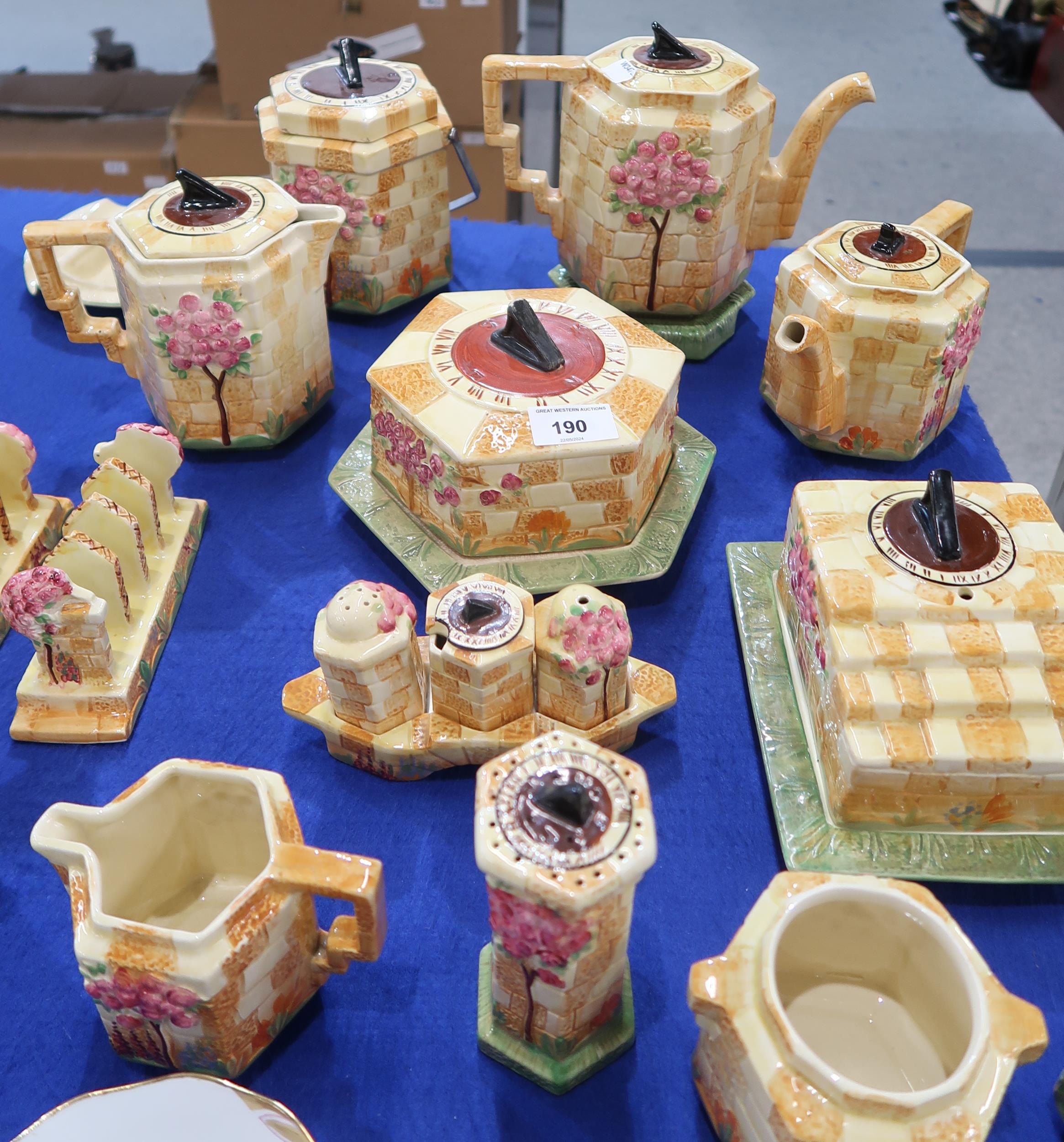 A collection of Beswick Sundial table wares including teapot, coffee pot, hot water pot, biscuit