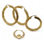 A large pair of hoop earrings 5cm diameter and two odd earrings, weight together 10.3gms Condition
