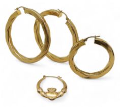 A large pair of hoop earrings 5cm diameter and two odd earrings, weight together 10.3gms Condition