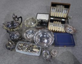 A large collection of EPNS including dish stands, swing handled baskets, comports, loose cutlery etc