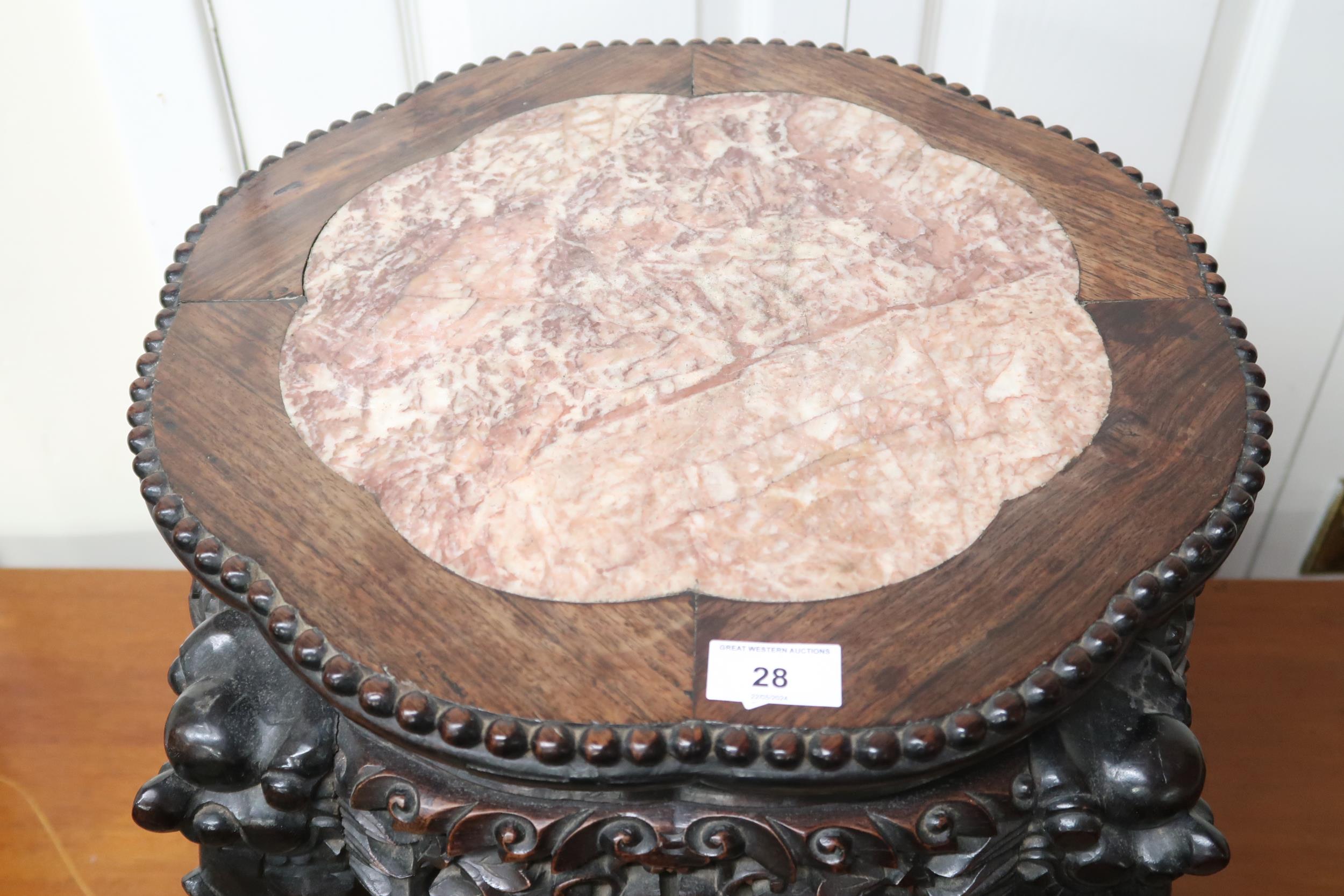 A Chinese hardwood jardinière stand with marble inset top over pierced friezes on carved ball and - Image 2 of 2