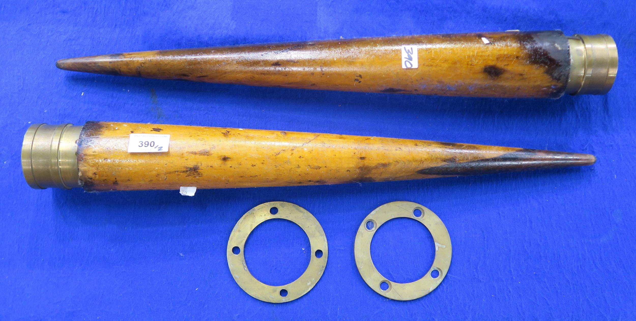 Two maritime rope worker's fids, each with brass mounting ring and measuring approx. 61cm in