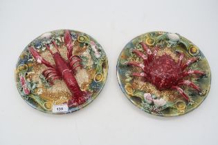 A pair of Palissy style plates, one with a lobster, the other a crab Condition Report:Available upon