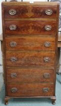 A 20th century mahogany veneered six drawer tall chest on cabriole feet, 124cm high x 64cm wide x