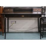 A contemporary metallic writing desk with two drawer superstructure over single frieze drawer on