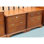 A pair of contemporary Younger two drawer bedside chests, 57cm high x 61cm wide x 46cm deep