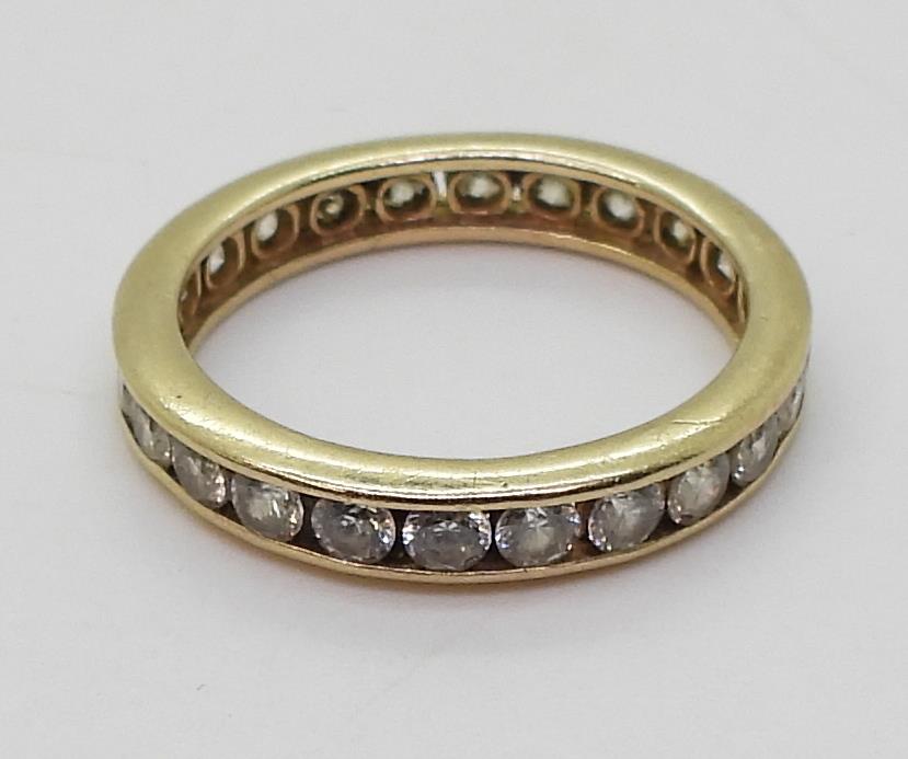 A 14k gold full eternity ring set with cubic zirconia, finger size O, weight 2.8gms Condition - Image 3 of 3