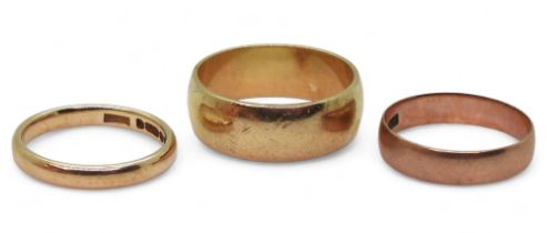 Three 9ct gold wedding rings, sizes N1/2, P, and U1/2, weight 10.5gms Condition Report:Available