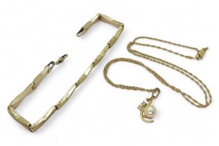 An 18k gold pearl pendant, weight 1.3gms, with a 14k rope chain weight 2gms, together with 9ct