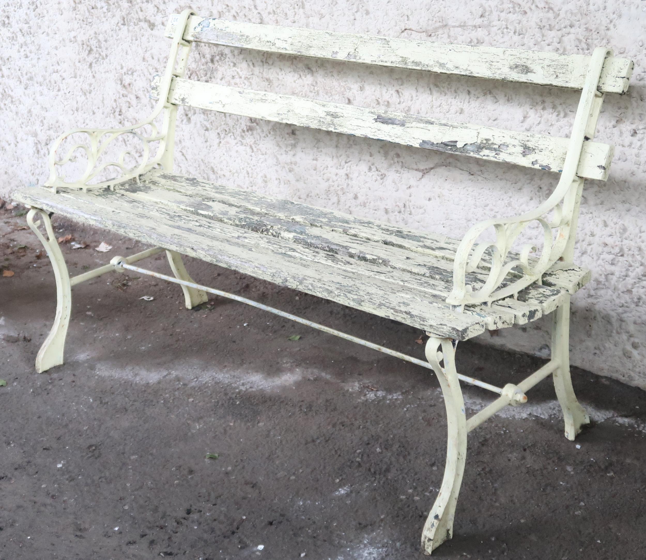 A 20th century yellow painted garden bench with scrolled cast metal ends joined by wooden slats, - Image 2 of 2
