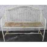 A 20th century yellow painted metallic garden bench with wire work back and sides over slatted seat,