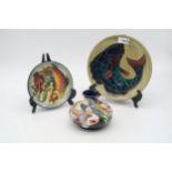 Three Moorcroft fish decorated pieces including a 1989 year plate, a smaller plate and a vase