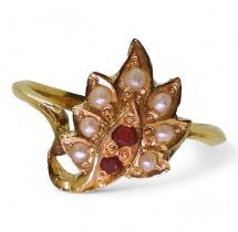 A bright yellow metal leaf shaped ring, set with red gems and pearls, size M, weight 3.3gms