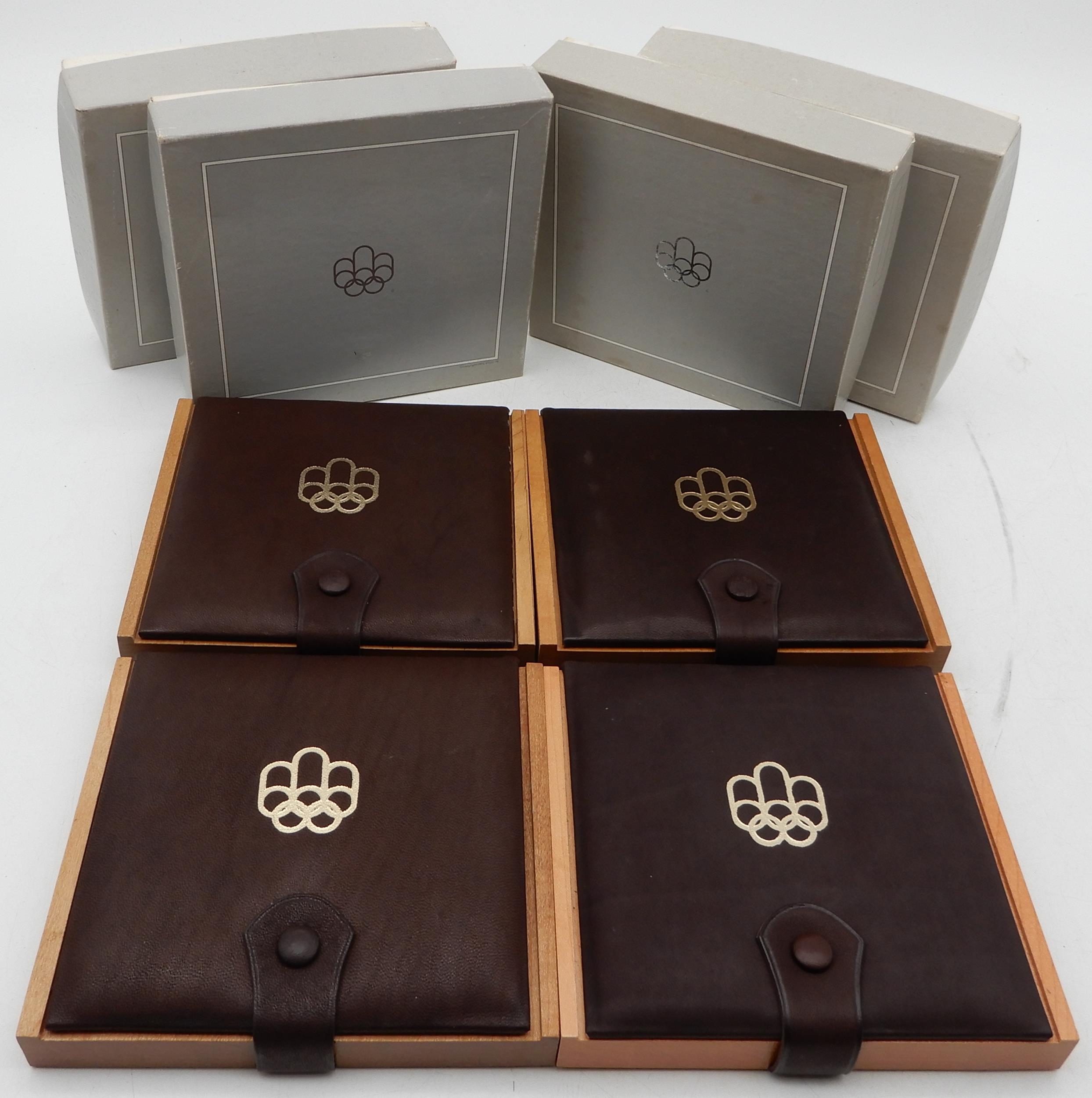 Canada Montreal Olympics 1976 silver four coin proof sets in presentation cases (4) Condition