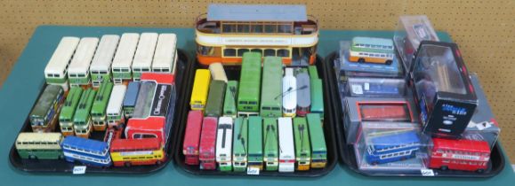 Assorted die-cast model buses and trams, with many by Corgi, to include examples in Glasgow