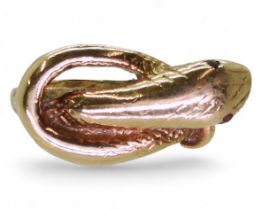 A 9ct gold snake ring with garnet eyes, hallmarked London 1980, size O1/2, weight 5.6gms Condition