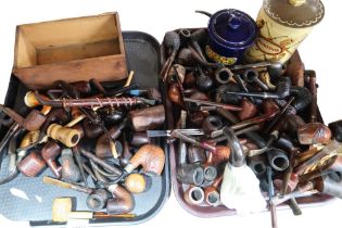 A collection of smoking pipes etc Condition Report:No condition report available.