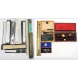 A collection of draughtsman's slide rules, a cased Sykes Hydrometer etc. Condition Report: