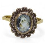 An 18ct aquamarine and diamond cluster ring, size P, weight 4.2gms Condition Report:Available upon
