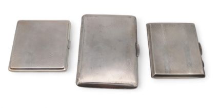 A silver cigarette case by Francis Howard Ltd, and two others, Birmingham marks, all with engine-