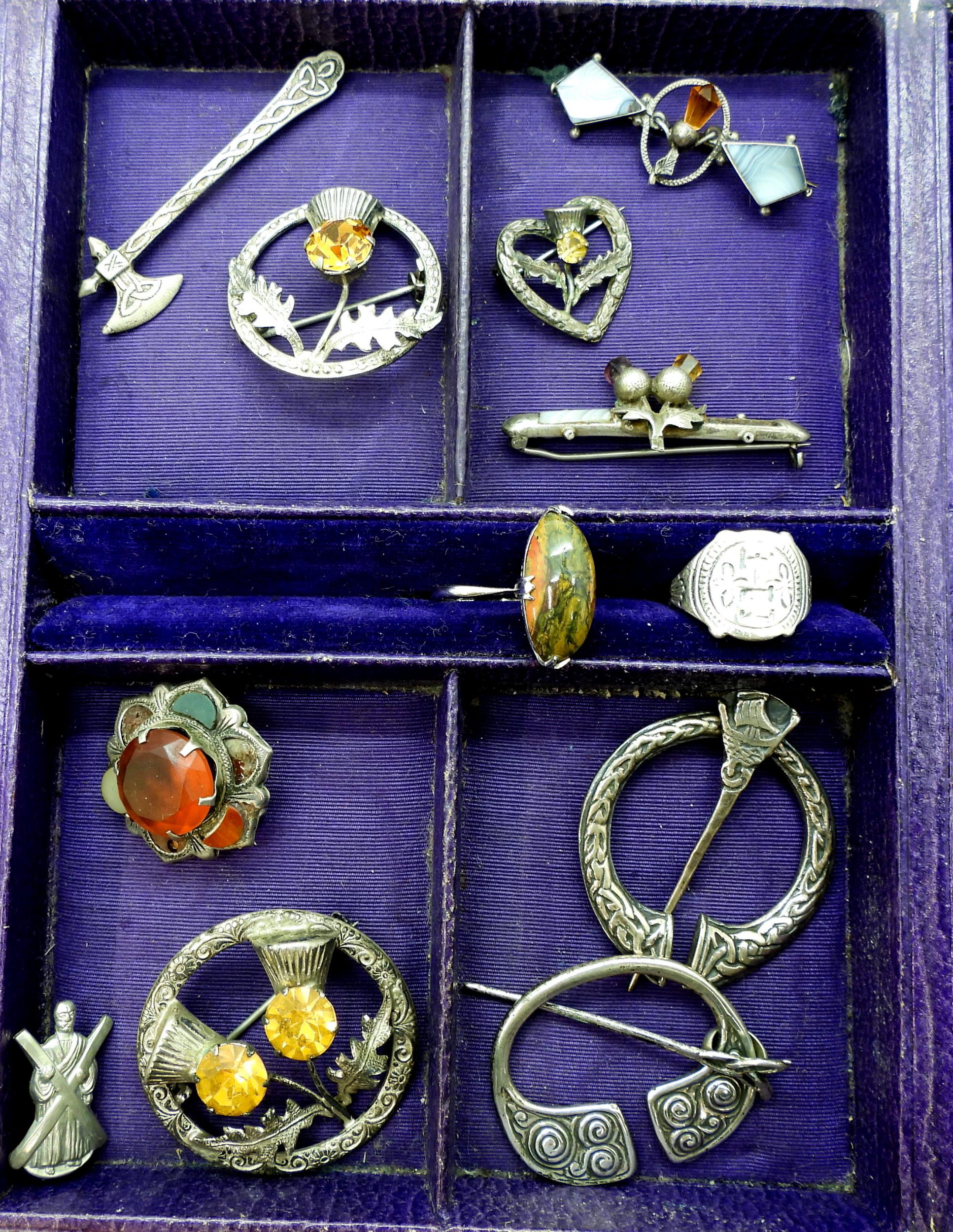 Scottish themed jewellery to include an Iain MacCormick, pen annular brooch, a further example by