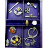 Scottish themed jewellery to include an Iain MacCormick, pen annular brooch, a further example by