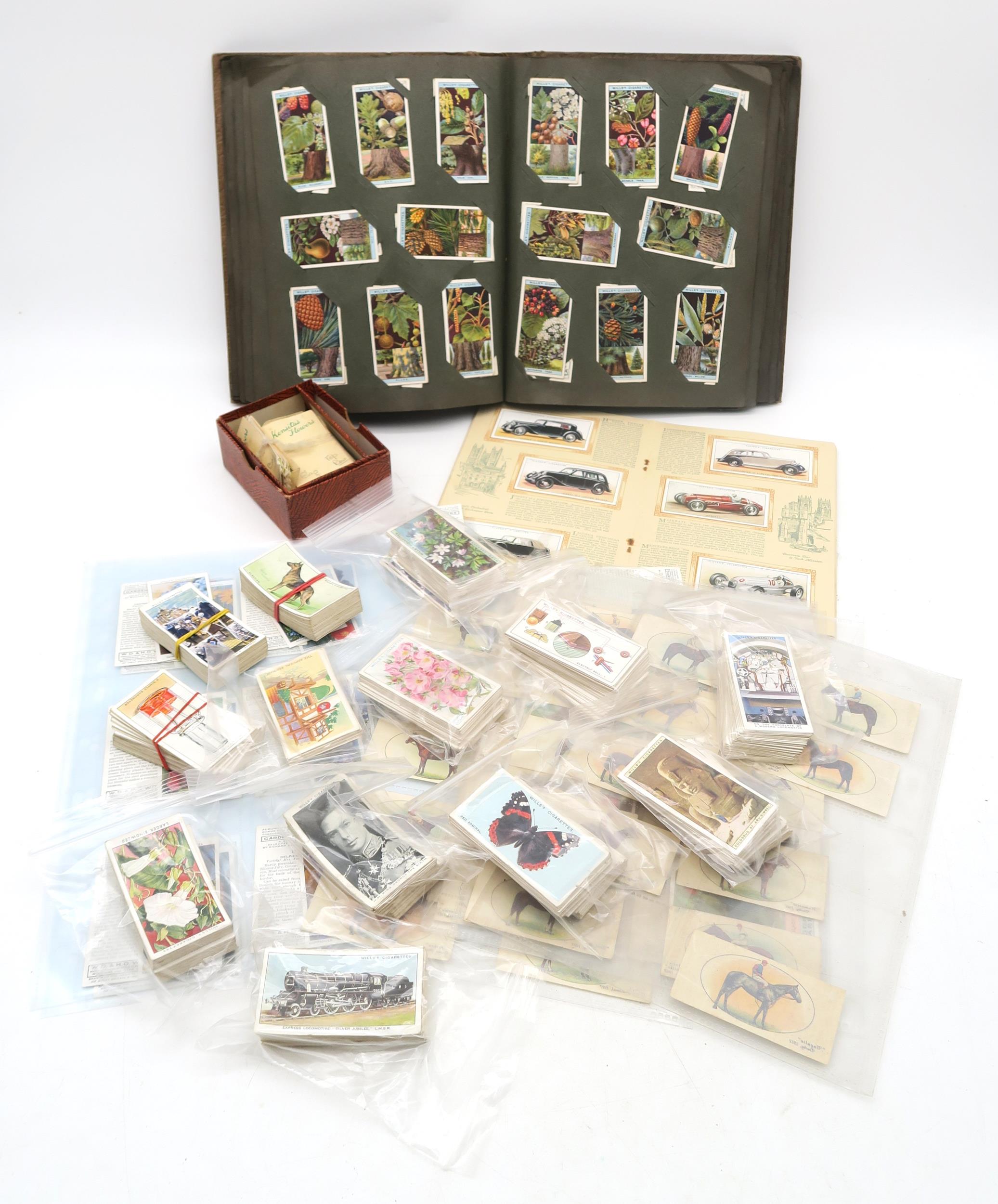 A collection of Wills cigarette cards, gathered in sets, including British Butterflies, Wonders of