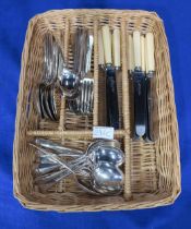 A collection of EPNS cutlery including spoons, forks, and knives Condition Report:Available upon