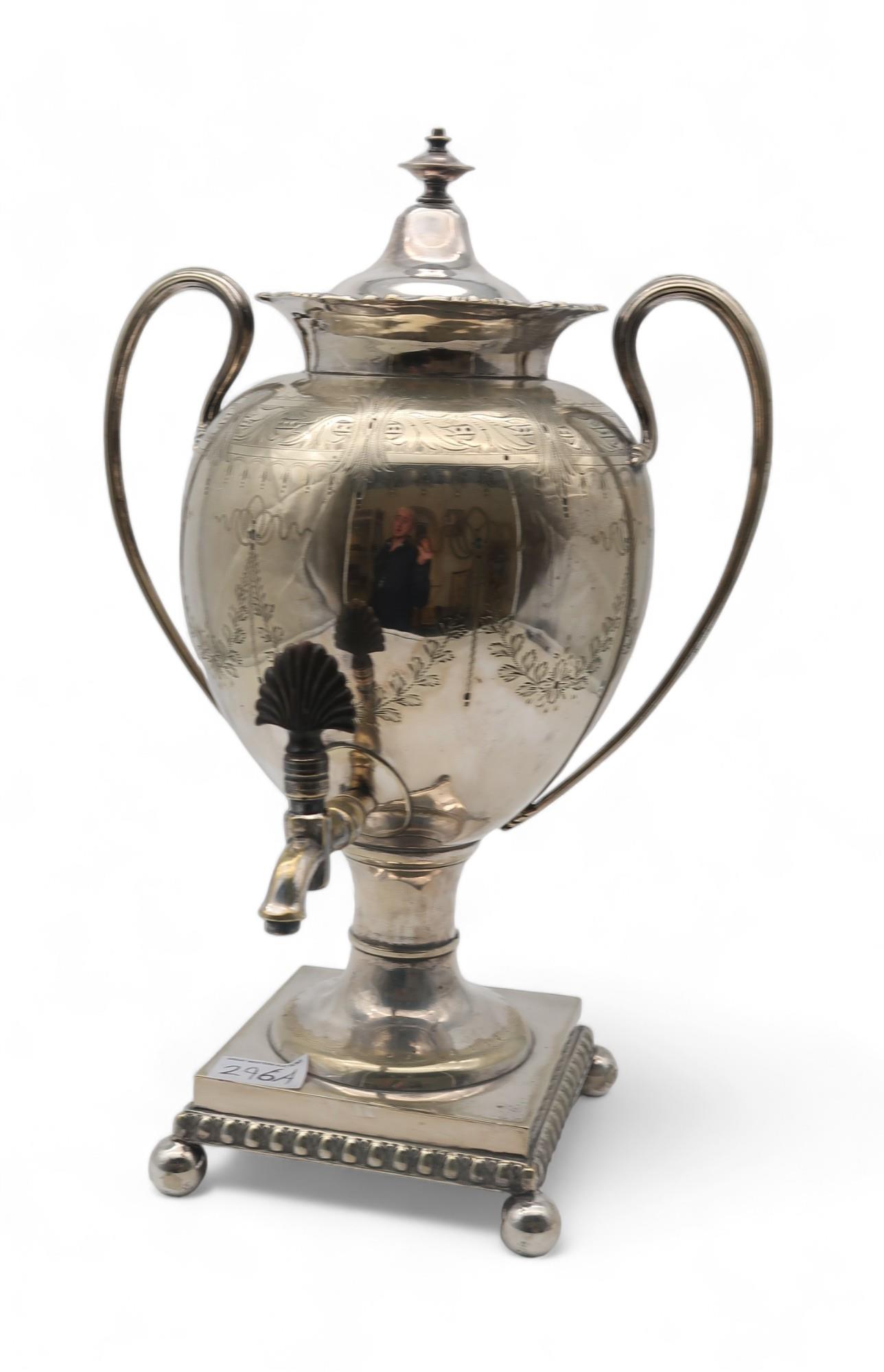 A Victorian silver plated tea urn, of neo-classical form, with engraved ribbon swags, with an