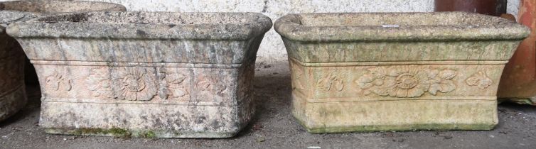 A pair of 20th century reconstituted stone "Willowstone" oblong garden planters with floral