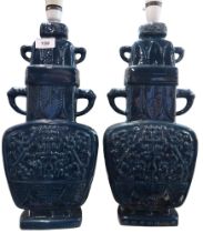 A pair of Chinese blue glazed vases turned into lamps, decorated with lappets, 48cm high Condition