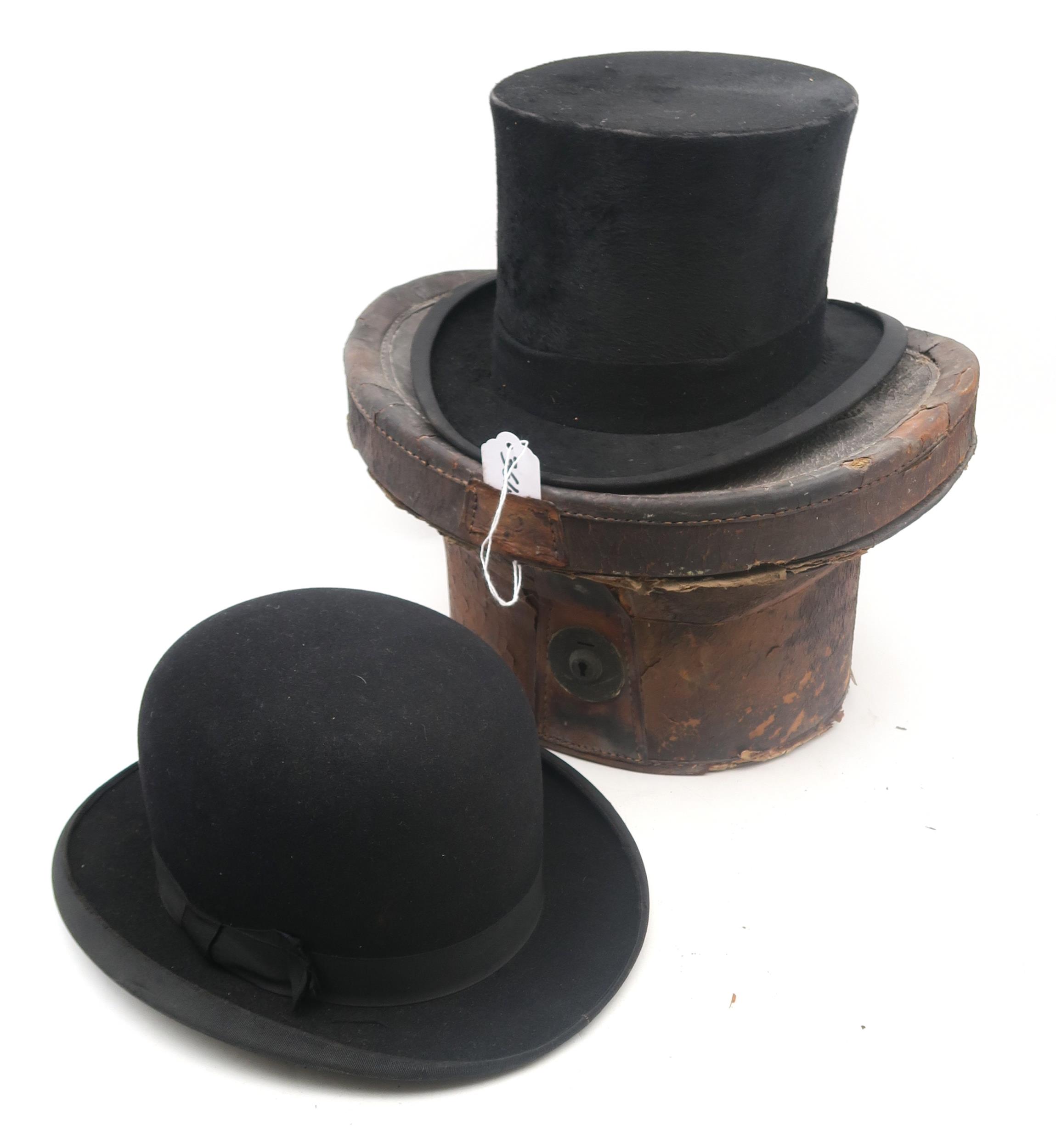 A silk top hat by Tress & Co., retailed by A.P. Dalzell of Belfast, of small-medium size,
