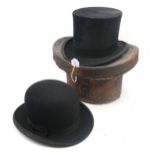 A silk top hat by Tress & Co., retailed by A.P. Dalzell of Belfast, of small-medium size,
