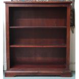 A contemporary stained teak veneered open bookcase with two adjustable shelves on plinth base, 109cm