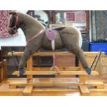 A contemporary "Pegasus, Crewe England" child's rocking horse, 98cm high x 122cm long x 54cm deep
