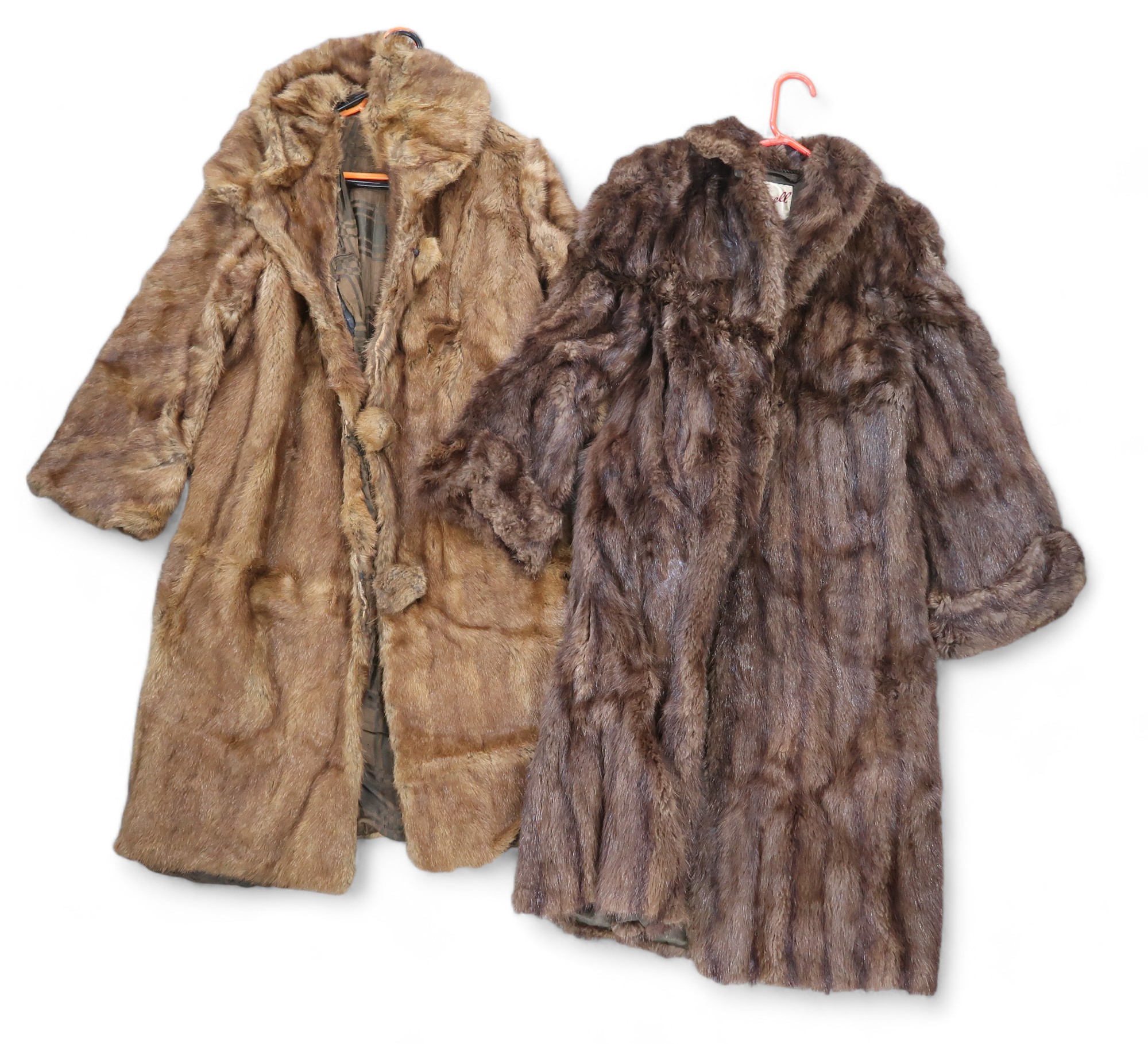 Three long dark fur coats and a fur stole (4)