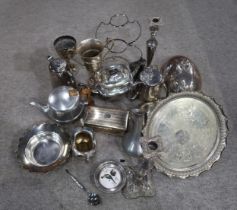 A large collection of EPNS including tea sets, loose cutlery, baskets, candlesticks, dishes,