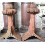 A pair of late Victorian terracotta Art Nouveau style roof finials with stylized florets, 55cm