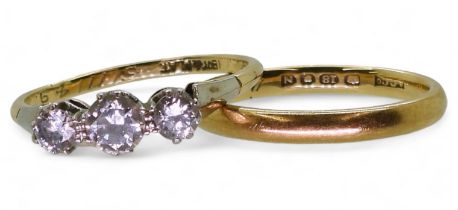 An 18ct gold three stone diamond ring, set with estimated approx 0.60cts, finger size Q, together