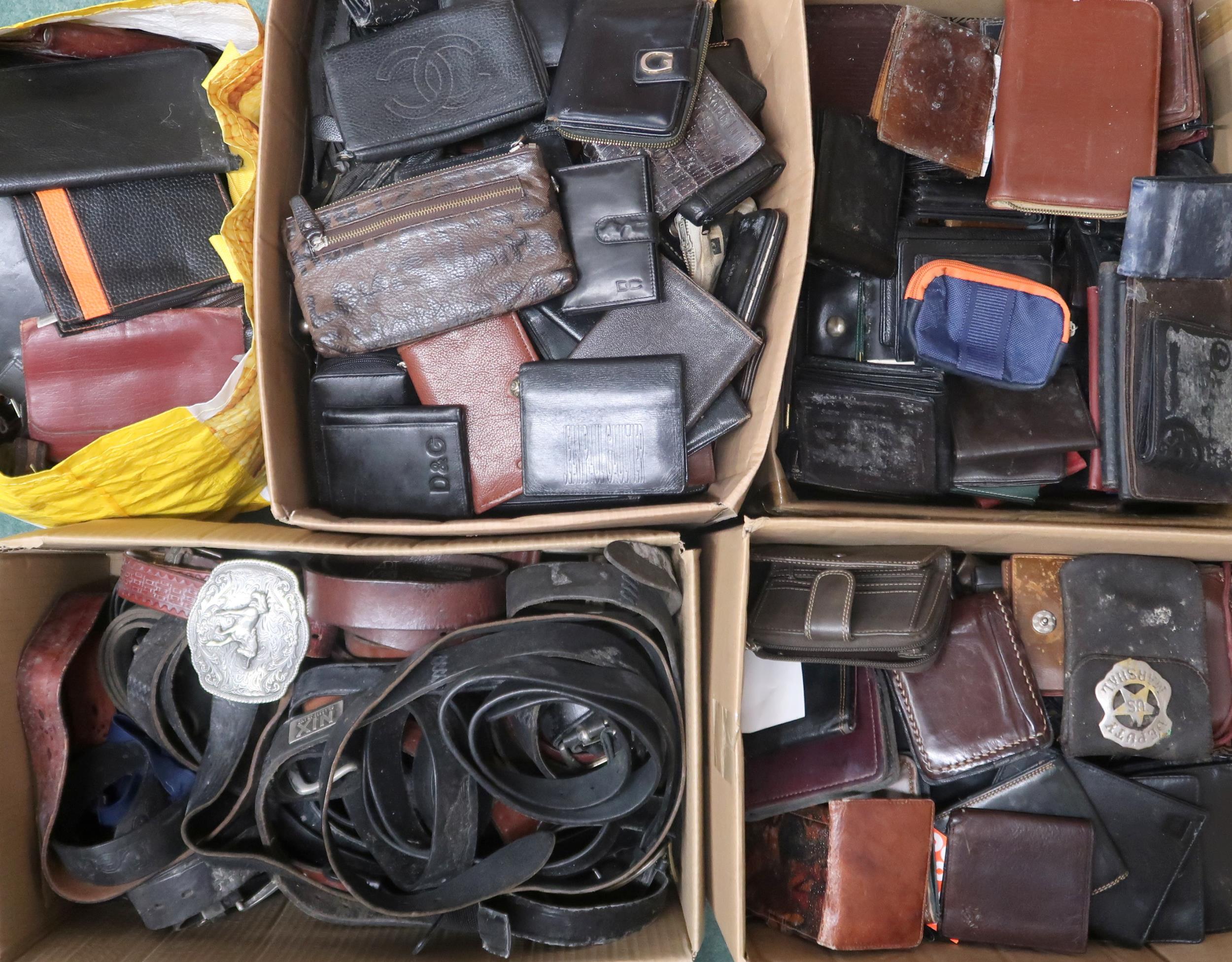 A lot comprising a large quantity of predominately gents assorted leather wallets and a box of gents